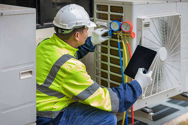 Professional Ac Installation technician working in Amazonia, MO